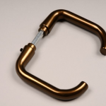 Curved pipe-handle